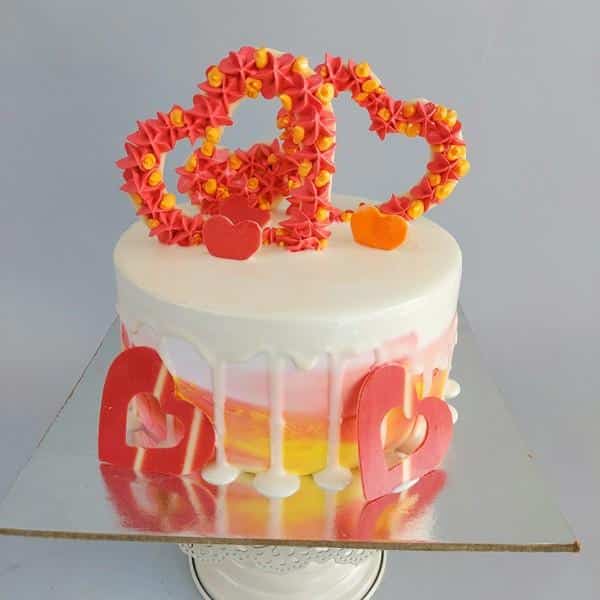 Designer heart topped Cake